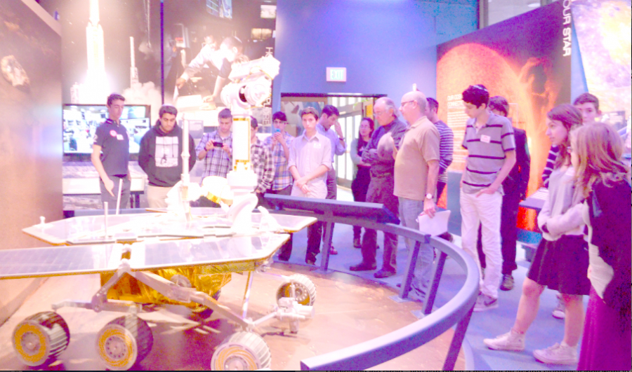 BIG DAY: Members of the Robotics Club examine replica of a lunar rover at NASAs Jet Propulsion Laboratory Dec. 4. Approval of the next Mars rover were announced while they were there.