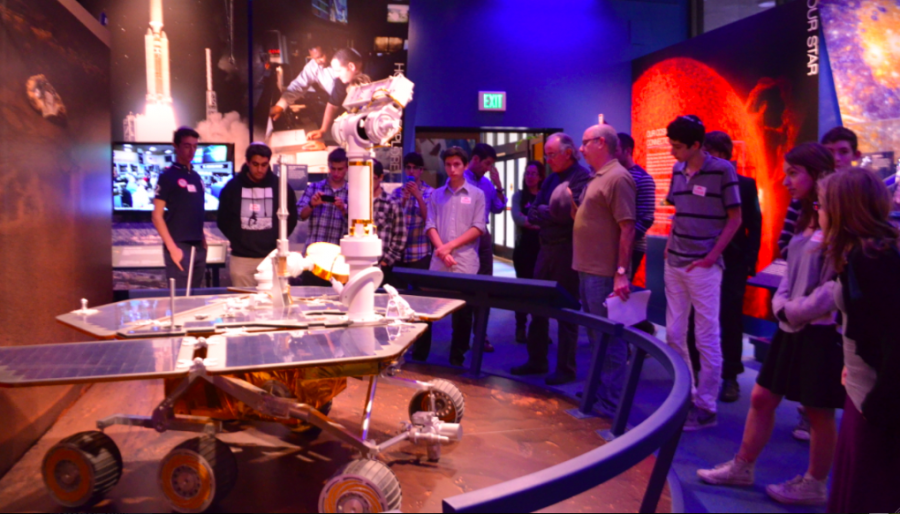 BIG DAY: Members of the Robotics Club examine replica of a lunar rover at NASAs Jet Propulsion Laboratory Dec. 4. Approval of the next Mars rover were announced while they were there.