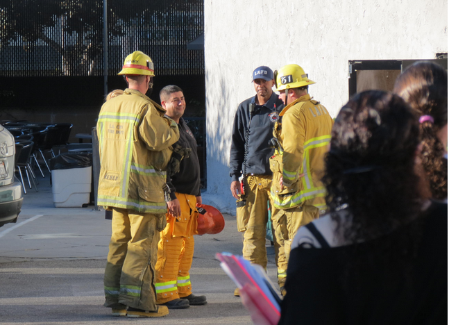 QUESTIONS: As students watched, members of the Los Angeles Fire Department conferred outside the Annex Thursday morning, Oct. 31.  No cause for the alarm had been found as of Thursday afternoon.