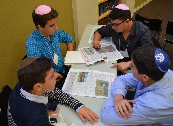 Student journalists from the Boiling Point, and the JCHS Observer debrief together after a series of workshops at the first ever JSPA convention at Bnai David Judea. 