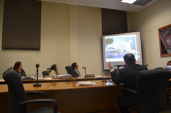 UNANIMOUS: From left, Marsha L. Brown, Chanchanit Martorell and Franklin Acevedo of Central Area Planning Commission viewed slides before voting to overturn and appeal Shalhevets building project. the apartments shown are planned for the Southern part of the current campus which will vacated when Shalhevet moves into its new building on the Northern side.