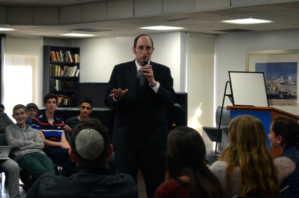 INSPIRING: Rabbi Meir Soloveitchik engaged students with smiles Dec. 12.  