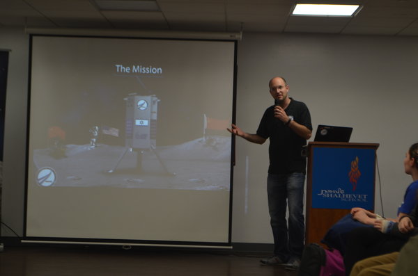 LUNAR: Yariv Bash presents his Tel Aviv-based company to students in a special assembly Jan. 29. His project, SpaceIL, aims to send a rover to the moon as part of Googles Lunar X Prize competition.