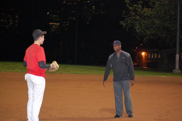 PRO: Coach Royster works out with sophomore Noah Rothman during baseball practice at Rancho Park. Hi previously coached the Milwaukee Brewers.
(Ezra Fax)