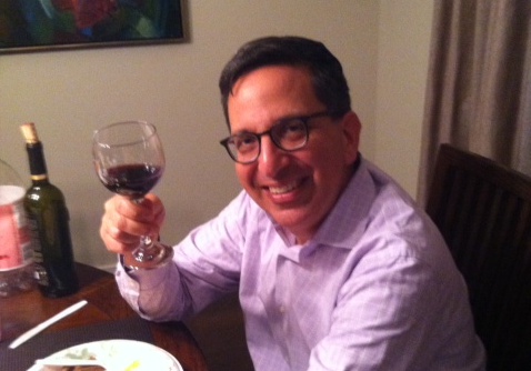 RAISE YOUR GLASS: Board treasurer Jeff Fishman drank some wine Thursday night on the day he signed papers closing the sale of Shalhevet's building to Alliance Residential.  Rabbi Segal and board president Larry Gill were out of town.