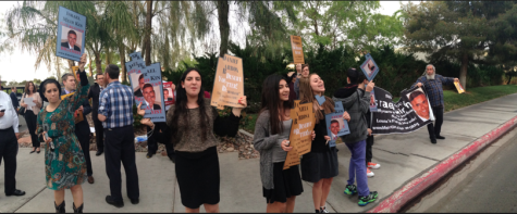 PROTEST: Sophomores Ariella Cohen, Shirin Nataneli and Natacha Chowaiki hold signs outside Meir Kin’s Las Vegas wedding March 20.  Despite remarrying, he has not given his wife a get.