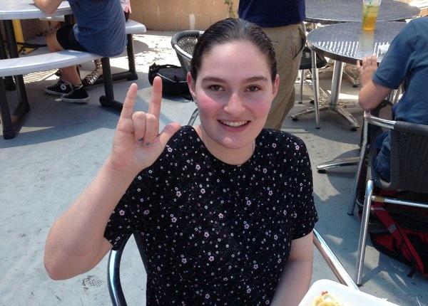 SIGN: Mira Wolman says "I love you" in American Sign Language (ASL), which she speaks fluently.