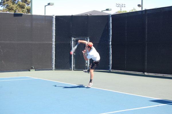 SERVED: Nathan Benyowitz serves the ball.  