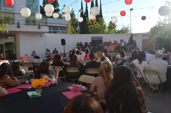 DEBUT: Freshmen and parents listen as Rabbi Segal welcomes them to Shalhevet at the orientation barbecue Aug 26.