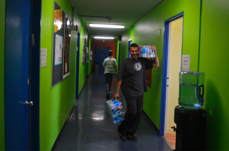 HYDRATE: Plastic bottles of cold water were delivered to 3rd-floor classrooms during Period H after administration announced that school would be cancelled.