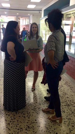 COUNSEL: Ms. Gruenbaum (​center) and Ms. Walls ​discuss college applications ​with Armand and Soheila Newman, parents of junior Nicole Newman​. ​