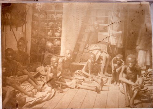 PASSAGE: Africans photographed in the hull of slave ship in 1868, heading for India. U.S. slavery ended in 1865.