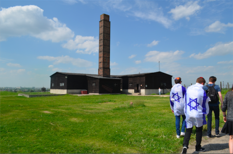 SMOKESTACK: Clearly visible from the surrounding city of Lublin, the  chimney at Majdanek jutted into a blue sky in a scene of unsettling beauty as seniors on the Poland-Israel trip approached.