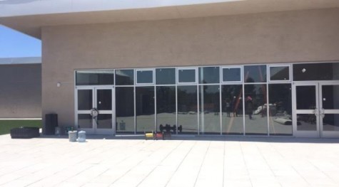 TRIBES: Above, the Beit Midrash hosts Hashkama minyan and a 9th-10th grade minyan, while the 11th-12th grade minyan is in the Beit Knesset next door. Twelve small windows represent the 12 tribes Below, the wooden Aron in the Beit Midrash.