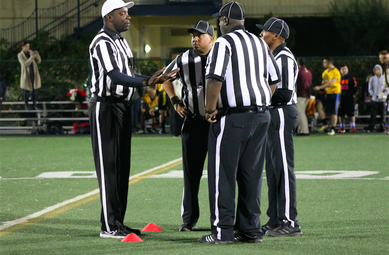 HUMAN: Referees conferred during the second half of the Coastal League championship game Nov. 5.  Players affected by missed calls said the human element is officially a part of the game.