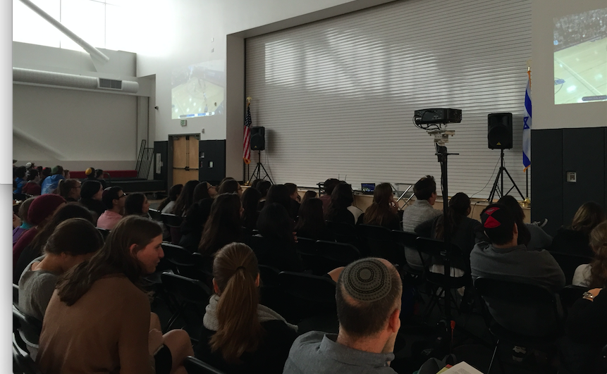 FINALS: Students gathered in the gym yesterday to watch the Firehawks face the DRS Wildcats in the championship game at Red Sarachek Tournament at Yeshiva University in New York.