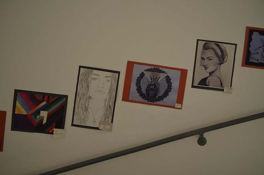 Along the schools staircase are art pieces created by students in Mrs. Roen Salems AP and 10th grade art classes.