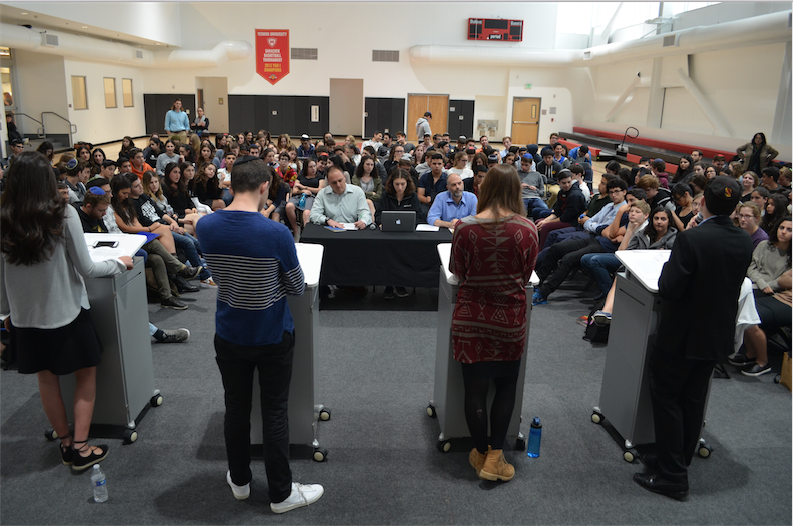 TABLE%3A+From+left%2C+General+Studies+Principal+Mr.+Daniel+Weslow%2C+Hannah+Jannol+of+the+Boiling+Point%2C+and+Dean+of+Students+Mr.+Jason+Feld+posed+questions+to+candidates+for+Agenda+Chair+in+the+gym+May+12.+