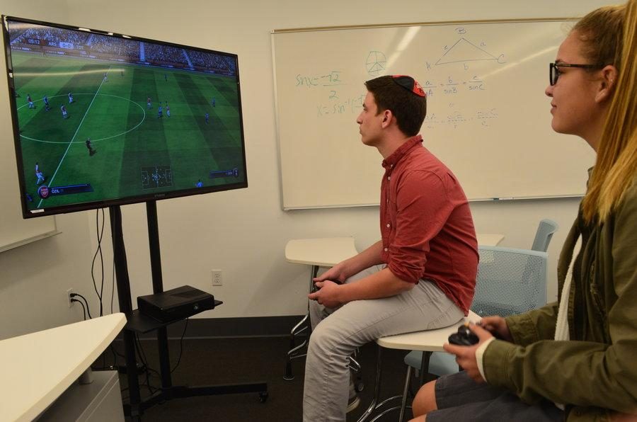 GAMING: Juniors Alex Silberstein and Lindsay Schacht face off during a lunch time FIFA match. Alex organized the FIFA tournament.  