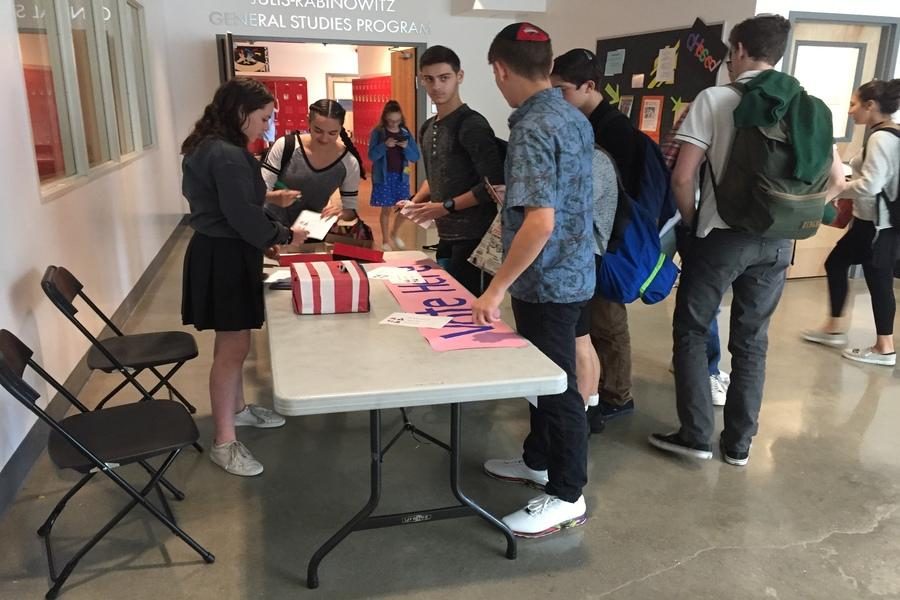 VOTERS: Students lined up to cast their vote outside the STEM lab.