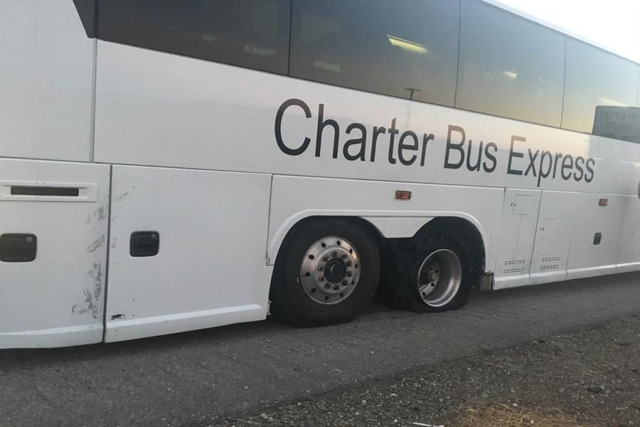 STALLED: Bus carrying sophomores home from trip in Arizona was stalled on Interstate 10 a few miles into California Sunday afternoon. Of the buss two right rear tires, the front burst and the rear went flat. Students heard a popping sound and then the bus began to scrape the roadway.