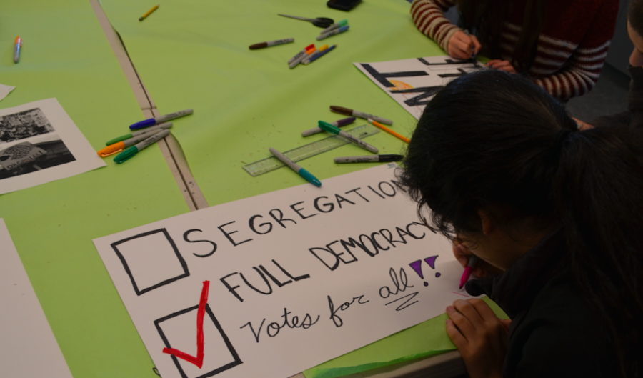 IMMERSE: Students made posters reflecting values of the Civil Rights era on Martin Luther King, Jr., Day Jan. 16.