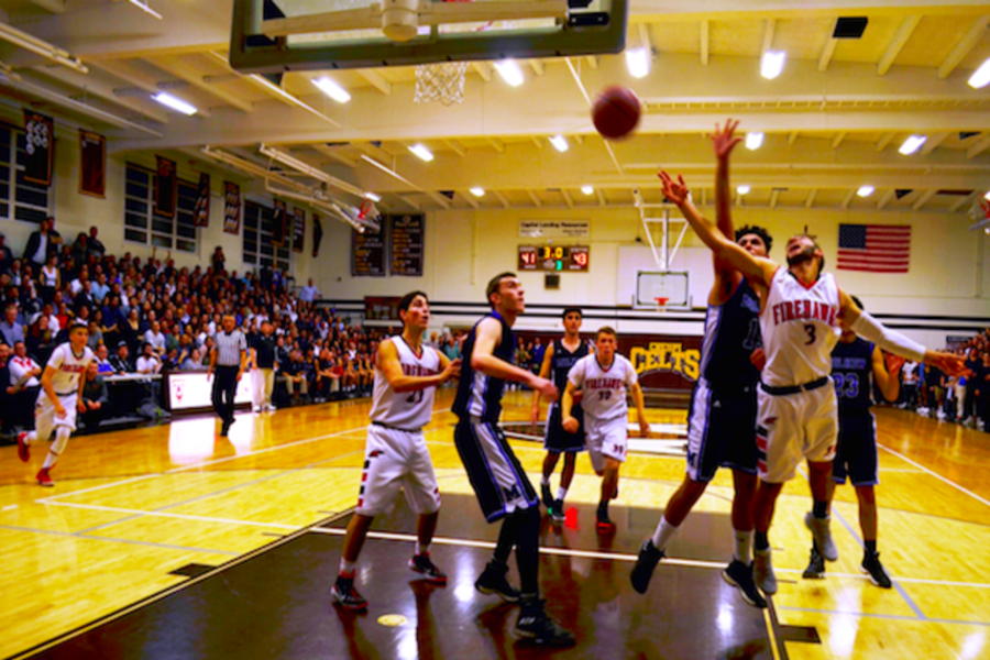 AIRBORNE: No. 3 Eitan Halpert overcomes a Wildcat block to score two points late in the third quarter in the gym of Crespi Carmelite High School in Encino March 1.  