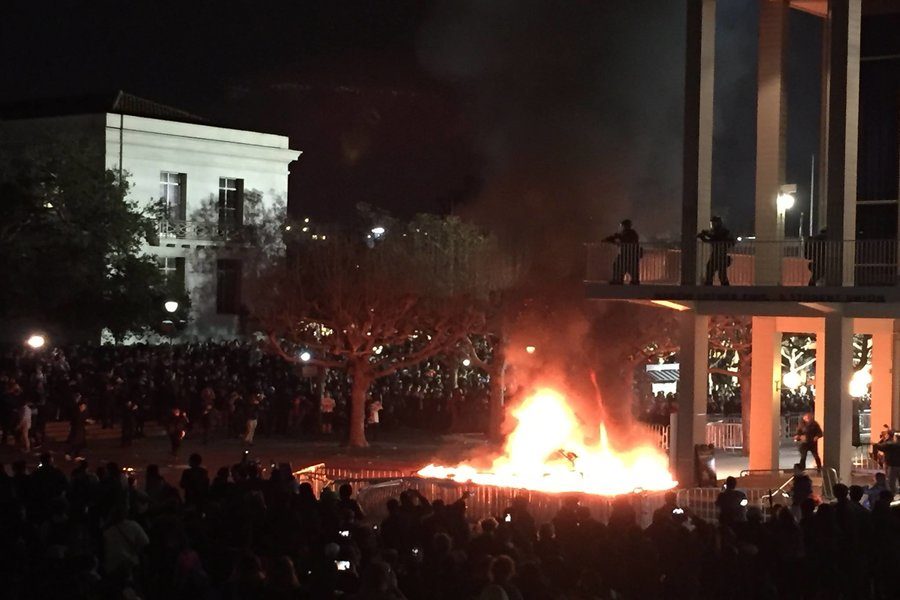 PROTEST: Joined by 150 outsiders, Berkeley students protested Milo Yiannoupoulous by setting fires and destroying property Feb. 1..