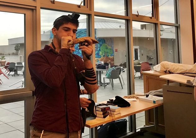 SHOFAR: Asher Dauer blew the shofar in the large Beit Midrash during Hashkama Minyan Sept. 19.