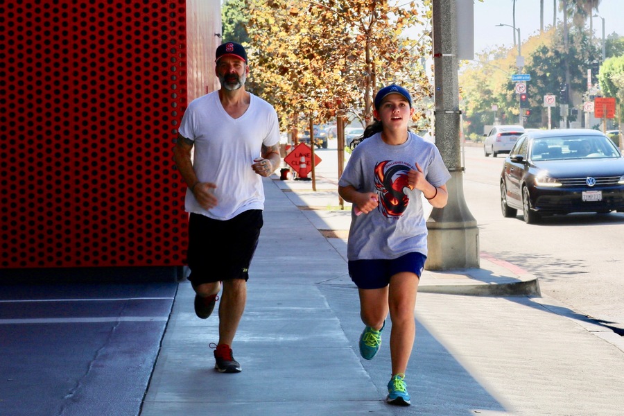 DASH: Members of the running club ran by the Peterson Museum at Wilshire and Fairfax Oct. 27.