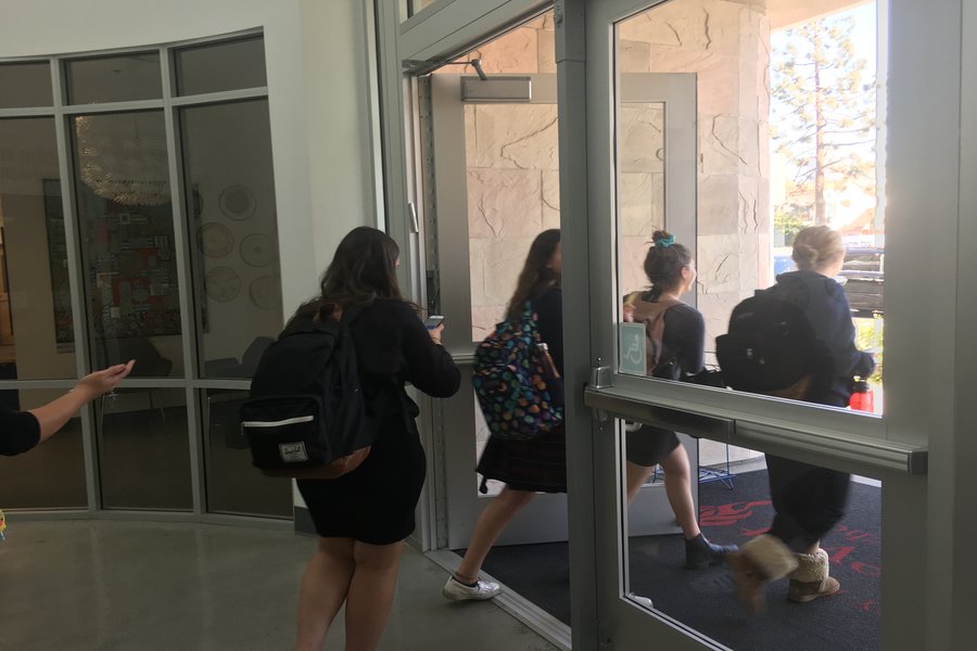 CLOSE: (From right) Summer Gershon, Noa Silberstein, Sophie Handelman, and Clara Sandler were among eight students who left school at lunchtime in hopes of getting home to the San Fernando Valley before traffic hindered by the Skirball Fire makes travel impossible.