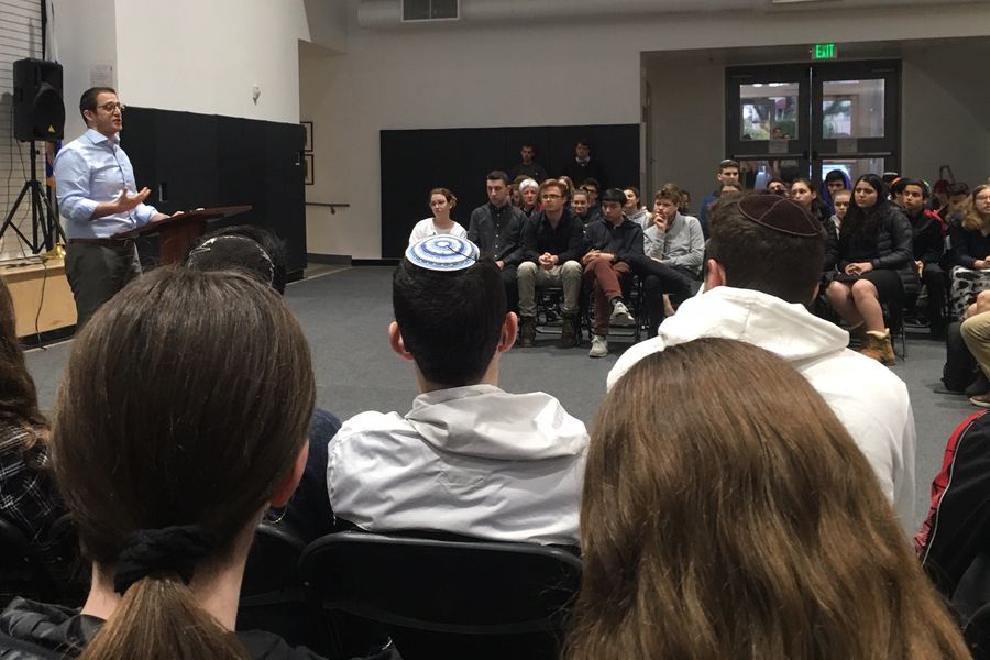 FOCUS: At an all-school assembly in the gym, Rabbi Segal told students to concentrate on their classes today but to seek out guidance counselors if they needed help.