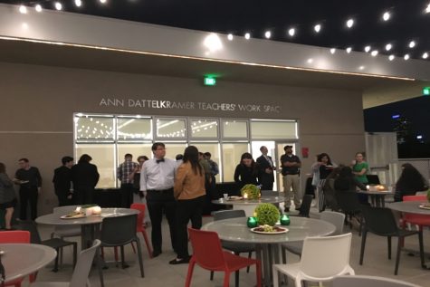 CELEBRATE: Students, teachers and parents mingled over sushi and salads on the roof Jan. 30 surrounded by platters of fresh fruit. It was the Green Team club's first event.