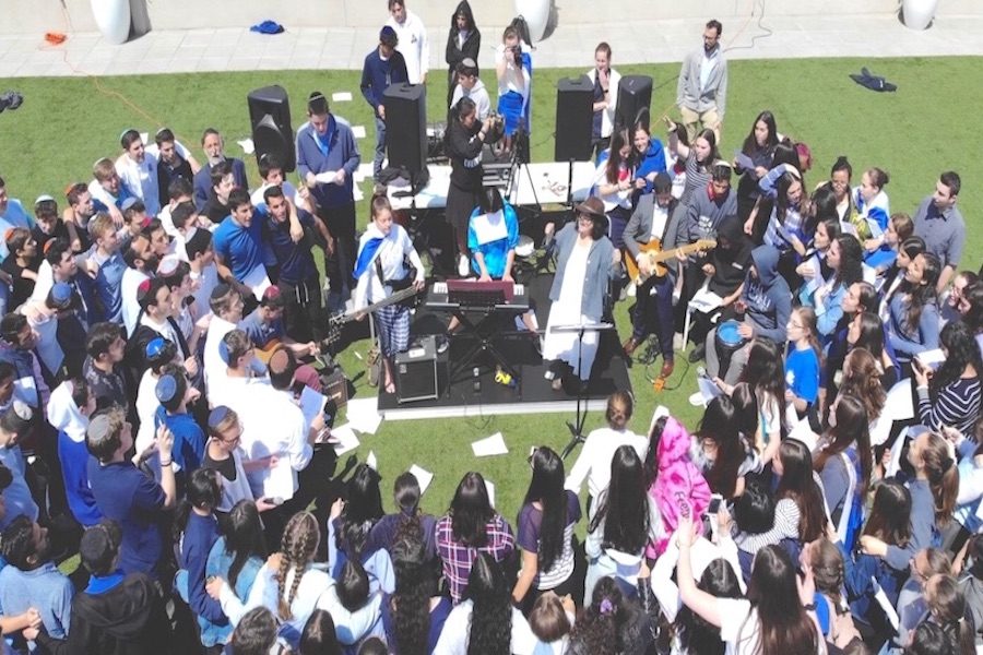 TOGETHER: Students and faculty sang and danced to Matisyahu’s ‘One Day’ in a Koolulam- style performance as part of the Yom Ha’Atzmaut celebration on April 19.