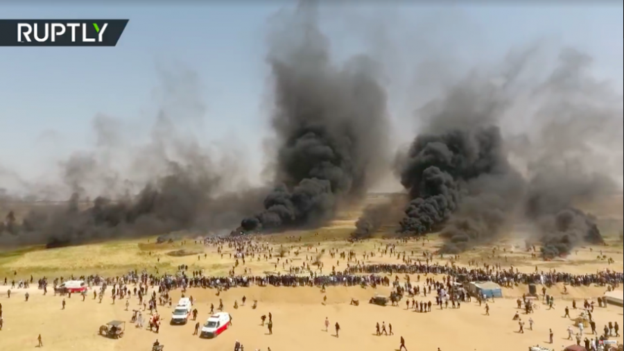 CONFLICT%3A+While+some+Gazan+protesters+marched+peacefully%2C+others+sent+explosives+and+flying+kites+into+Israel+as%0AHamas+leaders+called+on+the+crowds+to+cross+into+Israel.+IDF+sniper+fire+killed+more+than+100%2C+most+but+not+all+fighters.