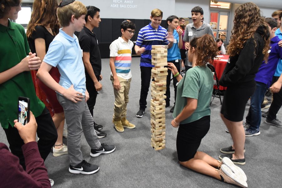  TEAM-BUILDING:  Freshmen bonded over several activities that encouraged teamwork and collaboration, such as Jenga.  BP photo by Zoey Botnick. 
