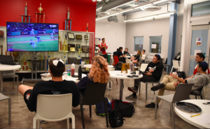 MIXED:   Dodger and Red Sox fans ate chicken wings and watched Game 2 of World Series together on Oct. 24 in the cafeteria.
