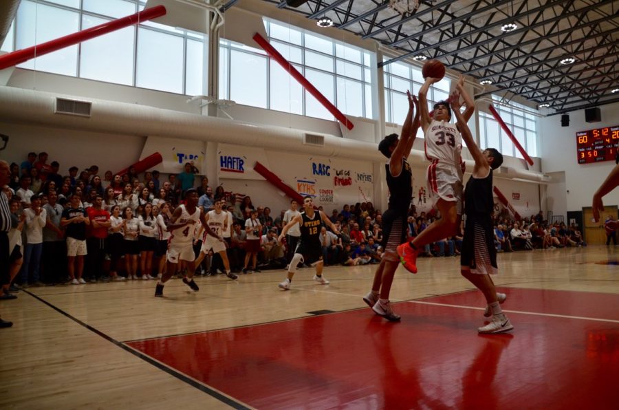 DOMINANT: The Firehawks led the entire game as they in Sundays championship against the SAR Sting. Asher Dauer, No. 33, jumped for a bucket in the games closing minutes.