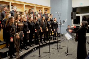 CANDLELIGHT:   On the fourth night of Channukah, the choir performed their holiday staples like Al Hanissim, Maoz Tzur and Mi Yemalel and the two new songs performed for the first time in concert.
