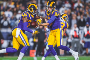 WINNERS:   LA Rams running back Todd Gurley receives a hand-off from quarterback Jared Goff in the teams 30 - 22 victory over the Cowboys Saturday night.