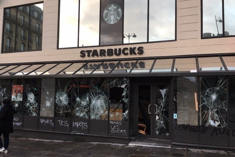 VIOLENCE:    A Starbucks outside the St. Lazare train station was vandalized and looted on Dec. 8, with inscriptions on the store saying ‘Pay your taxes’ and ‘Return us the money’.