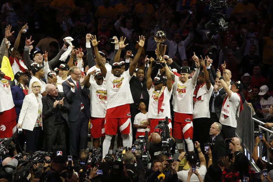 CHAMPIONS:    The Toronto Raptors celebrated after beating the reigning back-to-back champion Golden State Warriors in the NBA finals last June. It was Toronto’s first NBA title ever, led by Kawhi Leonard, who now will play for Clippers.