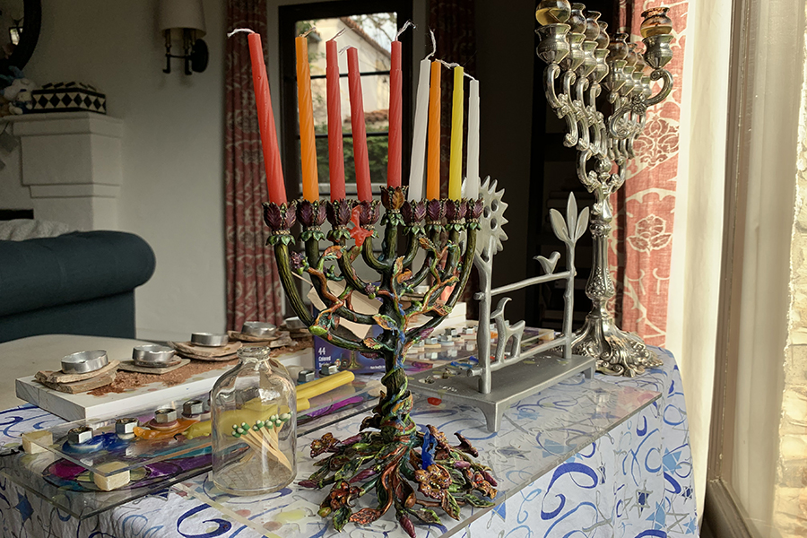 ENDING: As the menorah readies for eight candles at once, its a good time to consider to manage assimilation versus authenticity during the rest of the year.