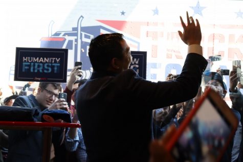CLOSE: Andrew Yang, candidate for the 2020 Democratic presidential nomination, waved to a cheering crowd outside of Tried and True Co. vintage clothing store on Fairfax Avenue just north of school Dec. 19. The storefront had been completely revamped with Yang hats, sweatshirts and other “merch,” and some of the crowd had arrived at 6 a.m., as they might for a drop of rare clothing from a popular manufacturer.