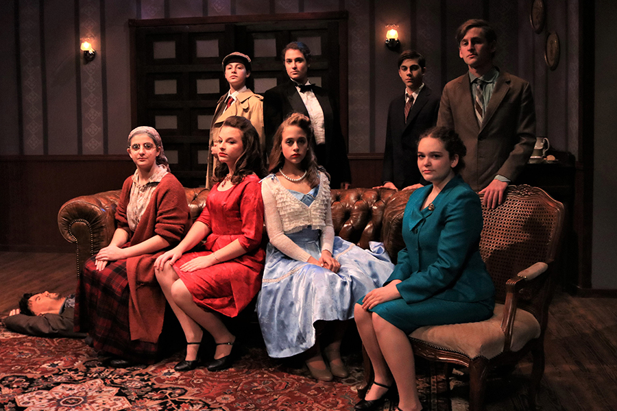 MYSTERY: The cast of Shalhevet Drama's fall mainstage sought a murderer while making larger points about the dramatic and journalistic arts.  Clockwise from far left, Lehava Segal, Hannah Poltorak, Rebecca Cohen, Zach Rub, Jacob Lefkowitz Brooks, Ariel Urman, Zoe Ritz and Neima Fax.