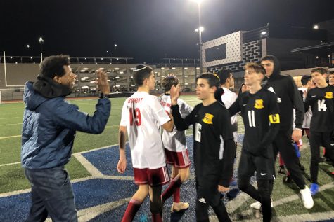 FRIENDS: Shalhevet and YULA players high-five each other after the Firehawk defeated the Panthers 3-2 Jan. 11. It was the second Firehawk victory over YULA in boys soccer since 2011.