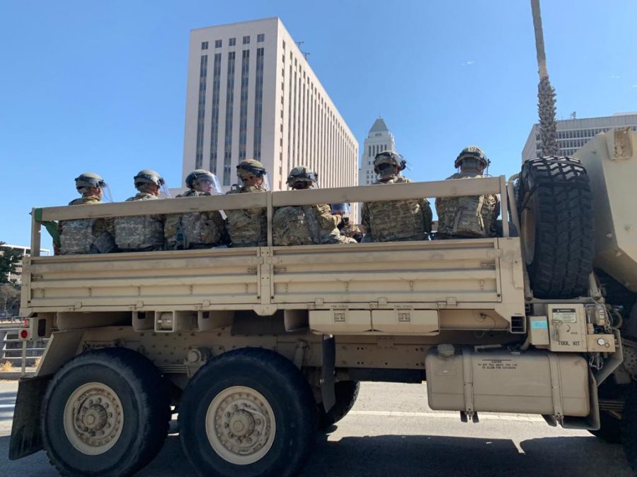 Members of the California National Guard arrived downtown yesterday to protect government buildings.