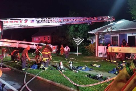 FIRE: Emergency personnel worked to extinguish an arson fire Aug. 25 at the Chabad Jewish Center in Newark, Del., which serves the University of Delaware’s Newark campus.