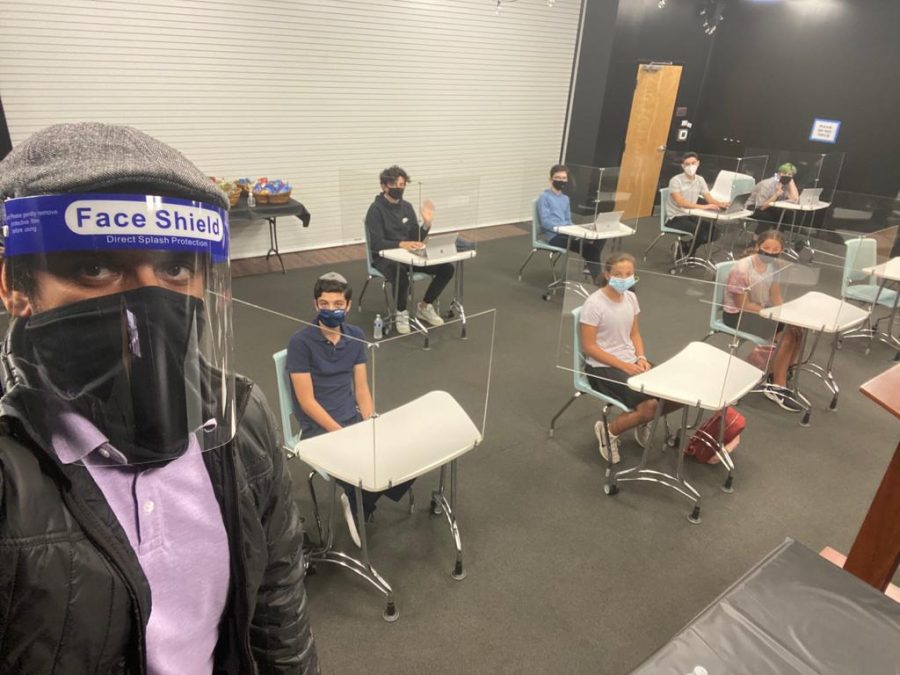 NEW : Students experienced plexi-glass desk dividers for the first time in the Wildfire Theater the week of June 29 while learning about cooking in different cultures with Mr. Tushar Dwivedi.