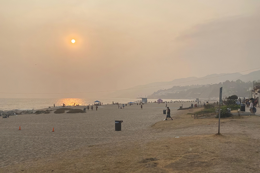 AIR: Smoke from fires as that ravaged the West Coast filled the skies Sept. 13, shrouding the sun at Will Rogers State Beach in the Pacific Palisades. The nearest fire was the Bobcat Fire in Pasadena, 29 miles away.
